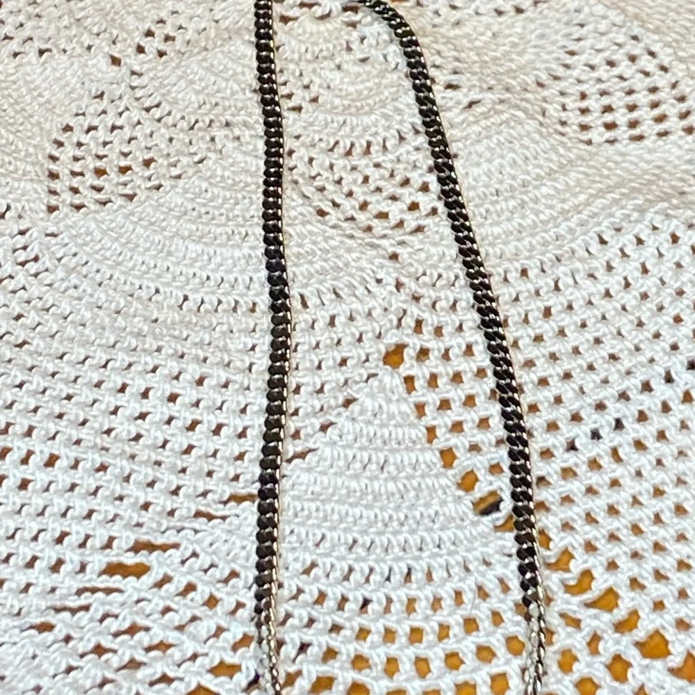 Intricate Silver Beaded Necklace with Symmetrical Design